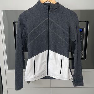 Gray and white zip up jacket